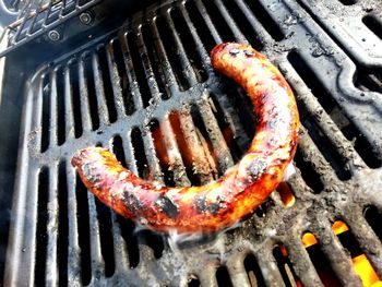 Close-up of meat on barbecue grill