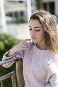 Young woman standing in city