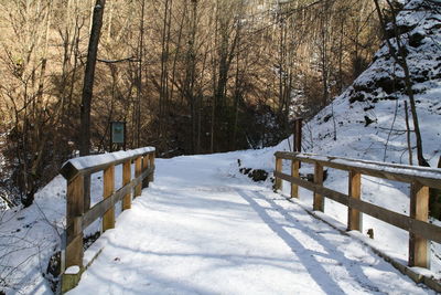 Snow covered footbridge