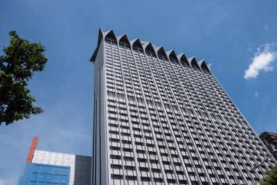 Low angle view of modern building against sky