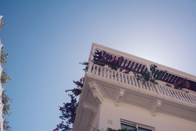 Low angle view of building against clear blue sky