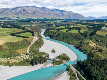 High angle view of landscape and mountains against sky