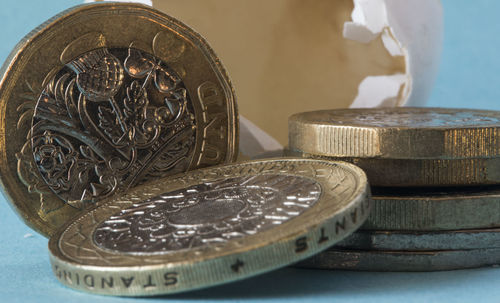 High angle view of coins on table