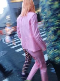 Rear view of man standing on street