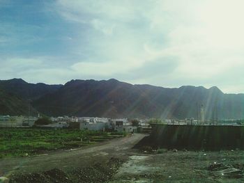 Road with mountains in background