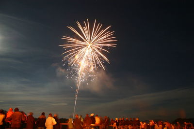 Firework display at night