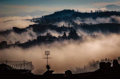 Scenic view of mountains against sky during sunset