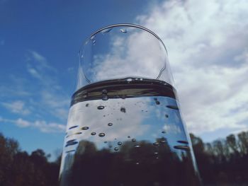 Low angle view of glass of building