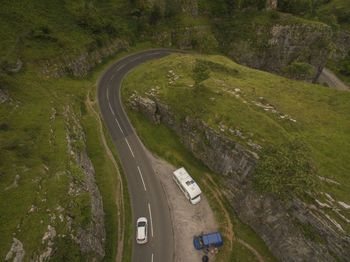 High angle view of road amidst trees