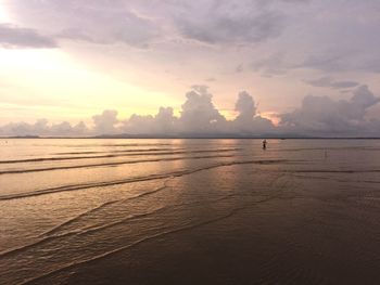 Scenic view of sea against sky at sunset