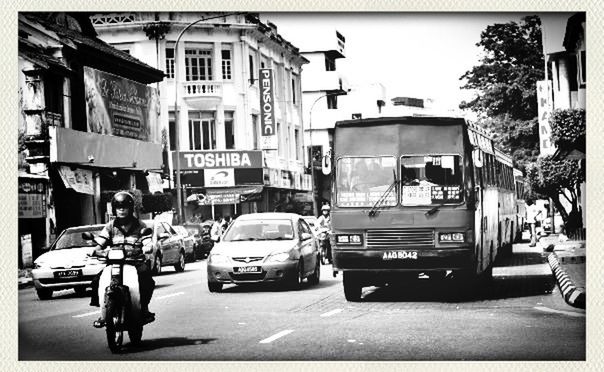 transportation, transfer print, car, land vehicle, mode of transport, street, building exterior, architecture, men, built structure, auto post production filter, road, walking, city, city life, person, on the move, lifestyles, city street