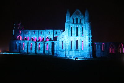 Close-up of illuminated building at night