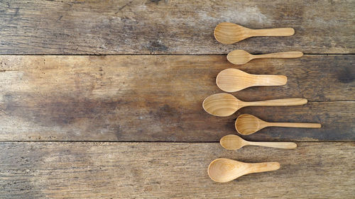 Directly above shot of wooden spoons on table