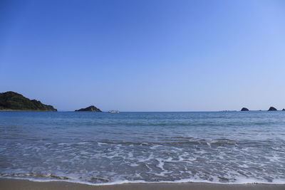 Scenic view of sea against clear sky