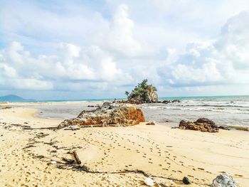 Scenic view of beach against sky