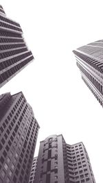 Low angle view of modern buildings against clear sky