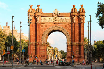 Group of people in front of historical building