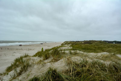 Scenic view of beach against sky