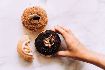 Cropped hand of person holding food