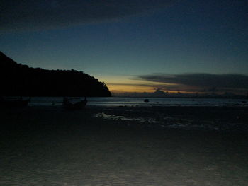 Scenic view of calm sea at dusk