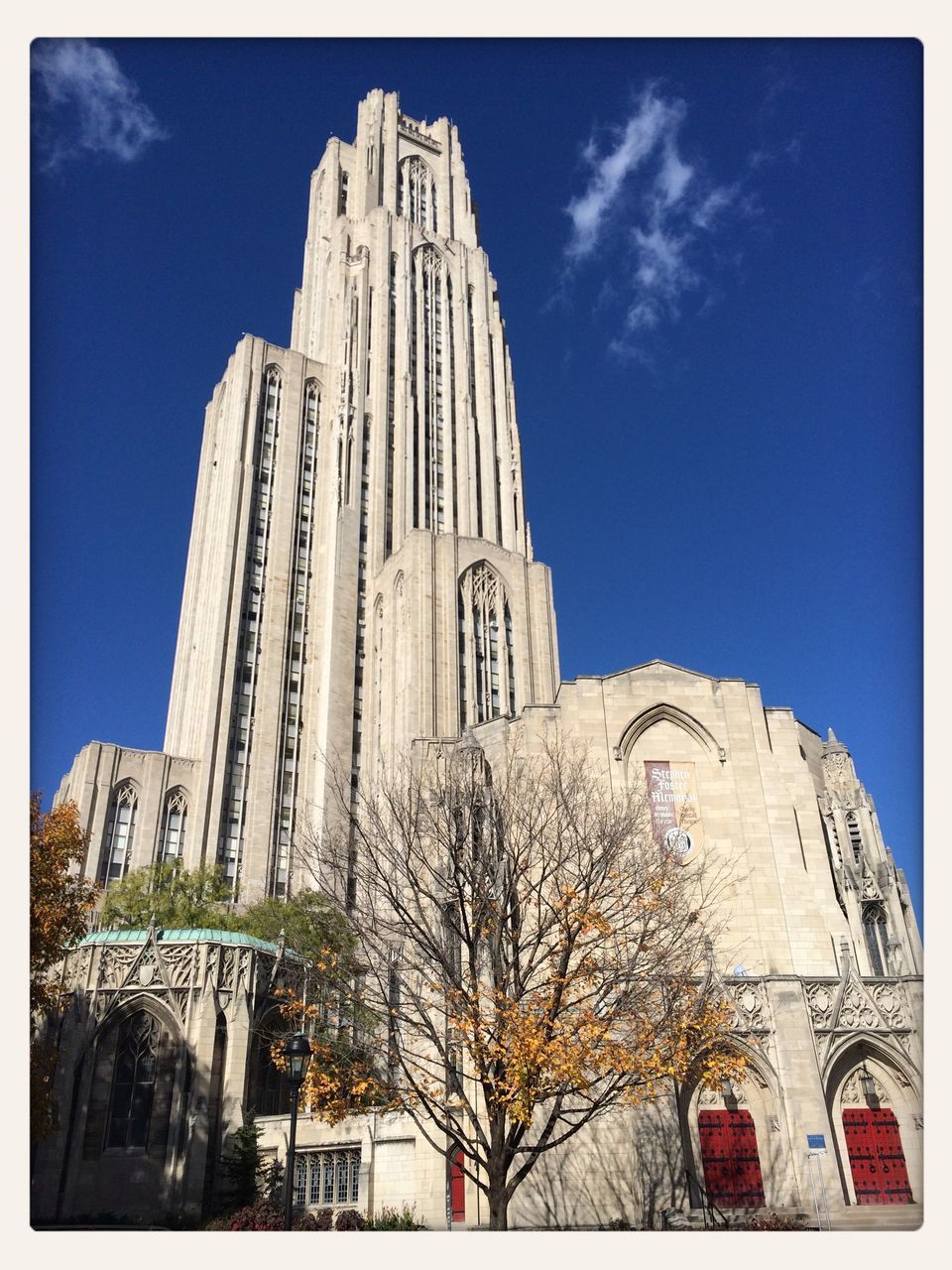 building exterior, architecture, built structure, transfer print, low angle view, auto post production filter, religion, place of worship, church, sky, blue, spirituality, tree, famous place, travel destinations, history, day, cathedral