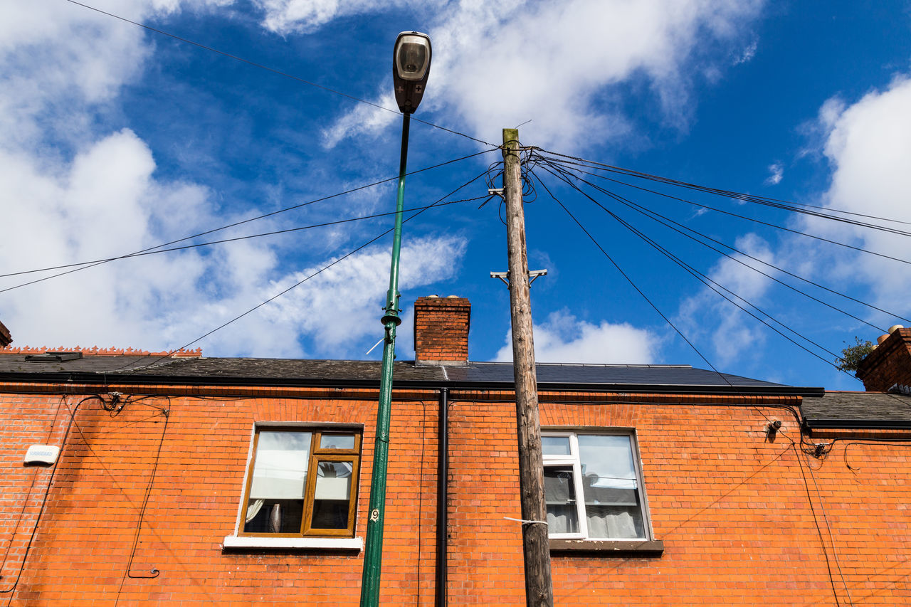 LOW ANGLE VIEW OF ELECTRICITY PYLON AGAINST SKY