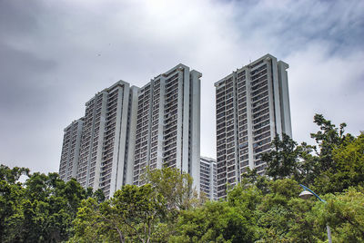 Low angle view of modern buildings against sky