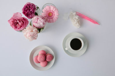 Directly above shot of pink flowers on table