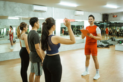 People exercising in gym