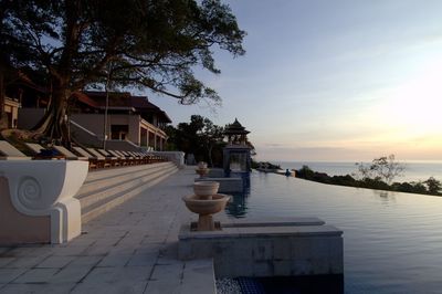 View of swimming pool in building against sky