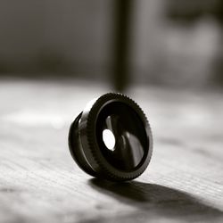 Close-up of camera on table