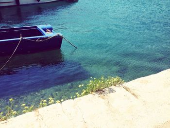 High angle view of ship moored on shore