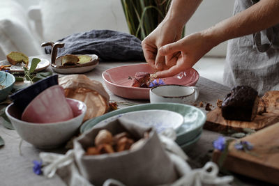 Midsection of man preparing food