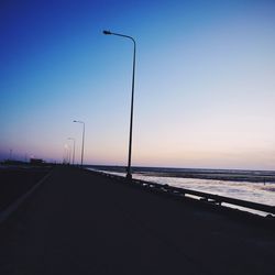 Scenic view of sea against sky at sunset