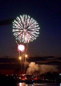 Firework display at night