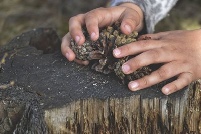 Close-up of man holding hands