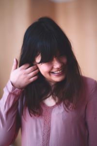 Portrait of a smiling young woman