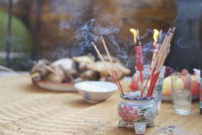 Close-up of burning candles