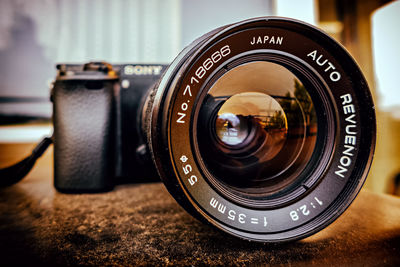 Close-up of camera on table