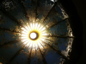 Low angle view of illuminated ceiling