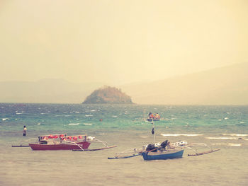 Boats in sea