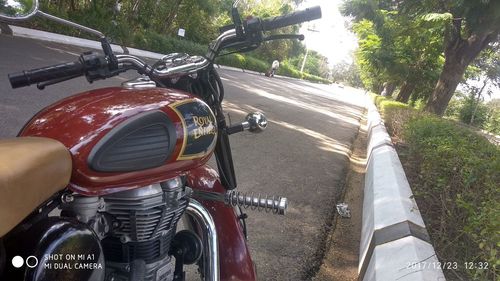 Close-up of motorcycle on the road