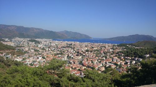 Aerial view of townscape against sky