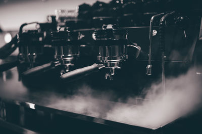 Close-up of steam emitting from espresso maker