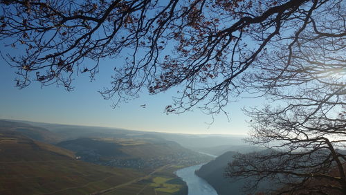 Scenic view of tree mountains against sky