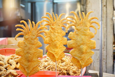 Close-up of yellow flower for sale at home