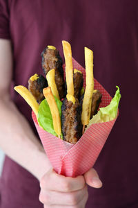 Traditional romanian food bouquet with meat rolls and french fries