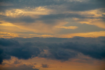 Low angle view of dramatic sky during sunset