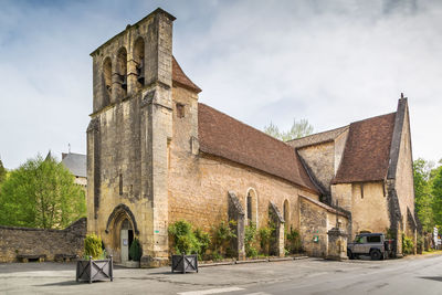 Exterior of historic building against sky