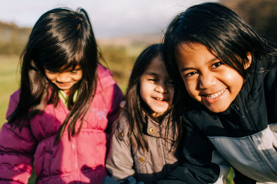 Happy girls playing in sunny day